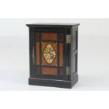 Victorian Aesthetic period ebonised and painted collector's cabinet, circa 1875, single door centred