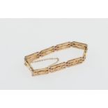 9ct gold fancy gate link bracelet, with safety chain, length approx. 15cm, weight approx. 15.5g (NB:
