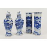 Two pairs of Chinese blue and white vases, late 19th Century, two being of lidded baluster form