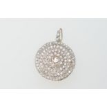 Diamond target pendant brooch, centred with an old round cut diamond of approx. 0.45ct, bordered