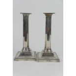 Pair of late Victorian silver candlesticks, by Martin Hall & Co., Sheffield 1896, with square