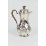 Victorian silver hot water jug, maker JHR, London 1900, repousse baluster form with foliate scrolls,