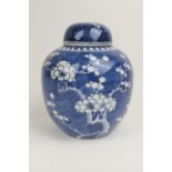 Chinese blue and white prunus pattern covered ginger jar, late 19th Century, height 21cm (NB: