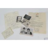 Stan Laurel and Oliver Hardy personalised postcard, signed by both and inscribed 'Congratulations