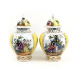 Pair of Helena Wolfsohn lidded jars, late 19th Century, in Vienna style decorated with panels of