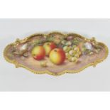 Royal Worcester fruit decorated oval dish, decorated with apples and grapes, signed Freeman, black
