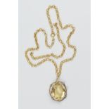 9ct gold peridot and pearl pendant necklace in 9ct gold, the large oval cut stone 23mm x 19mm,