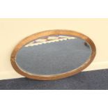 Arts and Crafts hammered copper oval bevelled glass wall mirror, 86cm x 54cm (NB: Condition is NOT