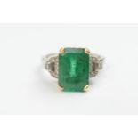 Emerald and diamond ring, the emerald of approx. 3cts, measuring approx. 12mm x 8mm, 6.5mm deep, set