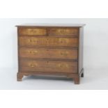 George III oak chest of drawers, circa 1800, fitted with two short and three long graduating drawers