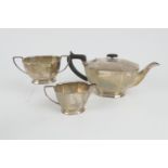 Elizabeth II silver three piece tea service, Sheffield 1967, comprising Art Deco Revival faceted