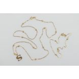 18ct gold box link and bead necklace, supporting an indistinctly marked initial 'S' pendant,