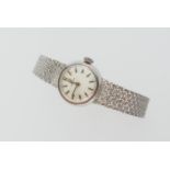 Omega 9ct white gold lady's bracelet wristwatch, circa late 1960s, 13mm silvered dial with baton