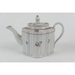 Newhall porcelain teapot, circa 1800, reeded lobed form decorated with floral sprigs against a white