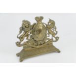 Victorian Royal Arms brass door porter, width 23cm (NB: Condition is NOT noted in catalogue
