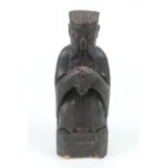 Tibetan carved wooden figure of a deity, 18th Century or earlier, traces of painted decoration, 25cm