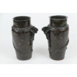 Pair of Japanese bronze vases, late Meiji (1868 - 1912), each cast with scrolling dragons chasing