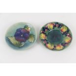 Moorcroft leaf and berries saucer, impressed marks, 12cm; also a Moorcroft pansy pin dish, 12cm (