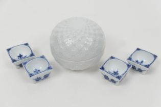 Four Meissen Onion pattern porcelain table salts, square form, each with crossed swords mark, 5cm;