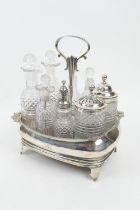 George III silver eight bottle cruet, maker indistinct, London 1810, the base of shallow baluster