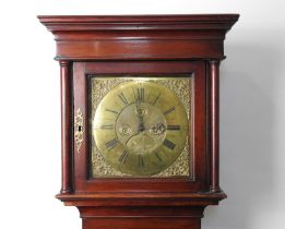 Walnut 30 hour longcase clock, 18th Century, with a brass 11 inch dial with matted centre and date