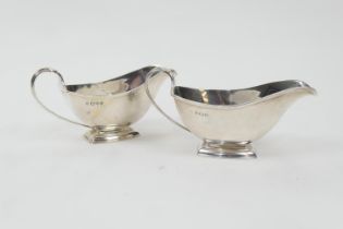 Matched pair of silver sauceboats by Adie Bros., Chester 1938 and Birmingham 1938, in plain Art Deco