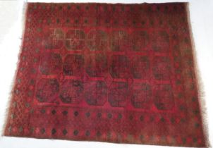 Turkish deep red ground bokhara carpet, with three rows of guls in a wide border, size approx. 300cm