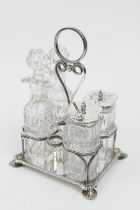 Victorian silver cruet, maker HA, Sheffield 1898, supporting four cut glass bottles, two with silver