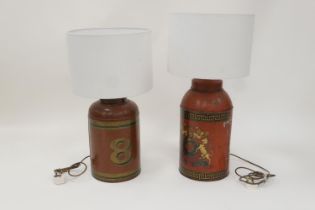 Two painted toleware ''tea cannister'' table lamps, each decorated with a crest against a