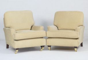 Pair of Multiyork chairs, upholstered throughout in pale gold fabric matching the two previous knole