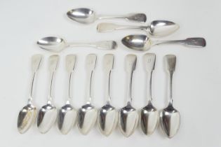 Composite set of twelve William IV silver fiddle pattern dessert spoons, comprising eleven by