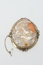 Italian carved shell cameo brooch featuring Hebe feeding Zeus nectar from a cup mounted in a 12ct