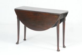 George III mahogany pad foot table, circa 1770, the top with demi-lune drop leaves supported on