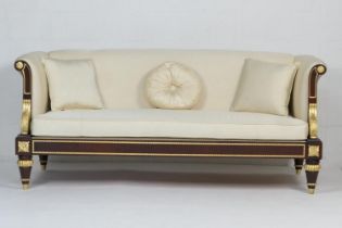 Clive Christian 'Emperor' mahogany and parcel gilt sofa, upholstered throughout in cream Clive