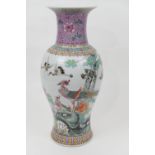 Chinese Republic porcelain vase, ovoid form with a pink glazed trumpet neck, decorated with exotic