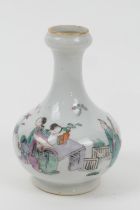 Chinese famille rose small vase, late 19th Century, decorated with figures in a fenced garden, 13.