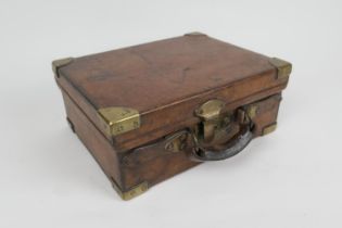 Sporting interest: calf leather and brass mounted cartridge case, with brass lock and oak