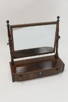 Late Regency mahogany dressing table mirror, rectangular plate on turned and ringed supports, the