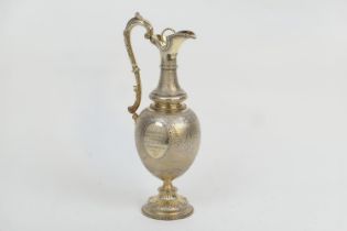 Victorian silver gilt wine ewer, by Alexander Macrae, London 1867, having a beaded trumpet neck with