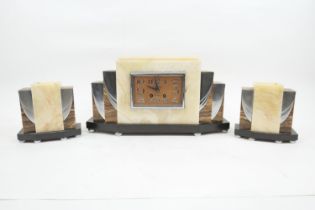 French Art Deco marble and chrome clock garniture, the clock with rectangular dial, signed 'Comptoir