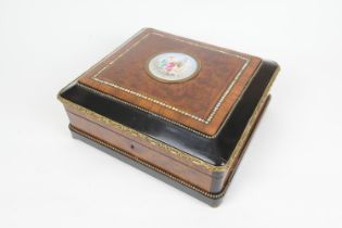 French amboyna, walnut and ebonised jewellery box, circa 1870, the top centred with a painted