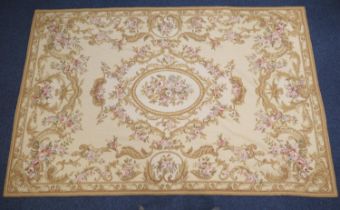 Aubusson style needlework bedspread, worked with a central floral cameo within multiple floral