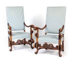 Pair of William and Mary style walnut and upholstered armchairs of grand stature, blue gingham