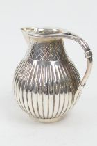 Victorian silver thistle form cream jug, London 1865, reeded baluster form, height 8.5cm, weight