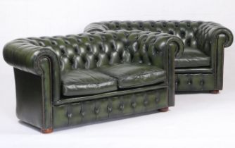Pair of green leather chesterfield two seater settees, width 160cm, depth 87cm (Please note