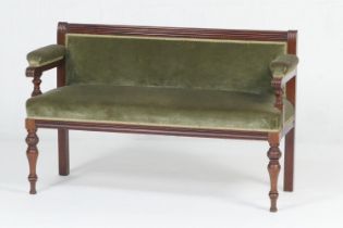 Victorian mahogany and upholstered hall bench, circa 1890, having a reeded frame and green fabric