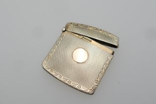 George V 9ct gold vesta case, by William Neale & Son, Chester 1912, with engine turned and bright