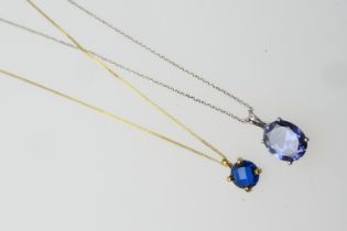 9ct gold fine curb link necklace, 44cm, weight approx. 1g, supporting a faceted circular blue