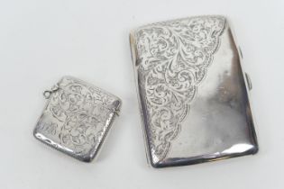 Edward VII silver curvex cigarette case, Birmingham 1901, scroll engraved corner decoration, 8.5cm x