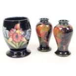 Pair of Moorcroft pomegranate small vases, inverted baluster form, impressed 'Burslem' mark and